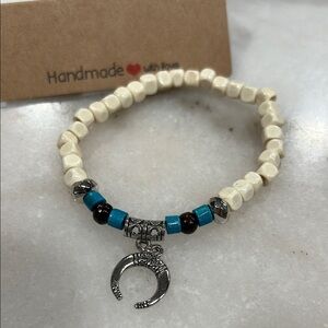 Handmade Beaded Bracelet with Silver Charm